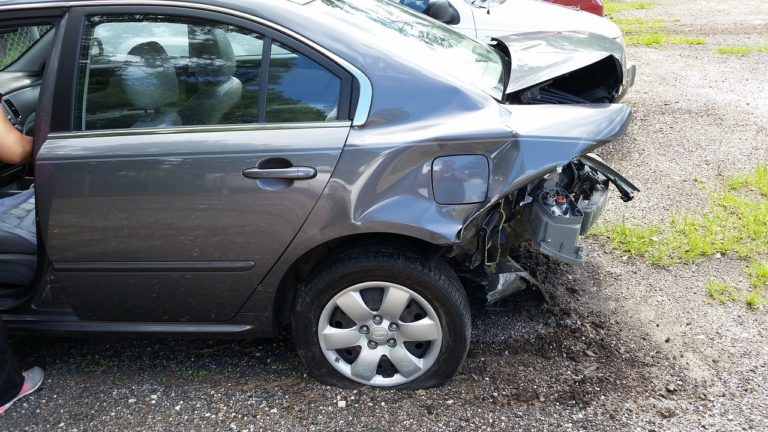 car's bumper destroyed after a low speed or high speed rear-end accident