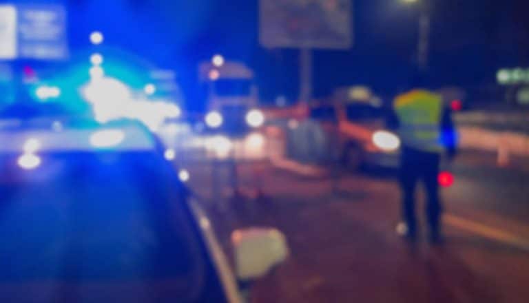 ambulance at the scene of a high-speed car crash
